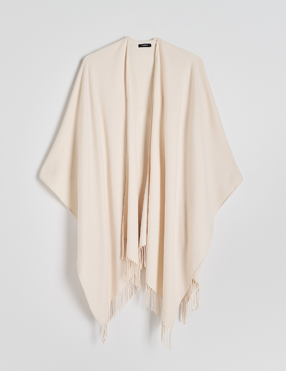 Poncho Reserved, crem