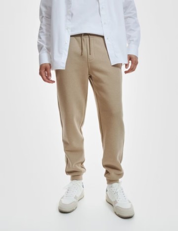 
						Pantaloni Reserved, crem
